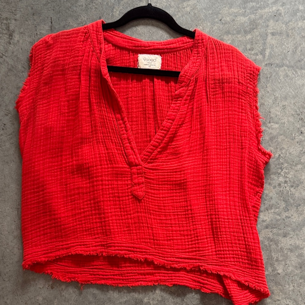 Vibrant Red Sleeveless Asymmetrical Blouse